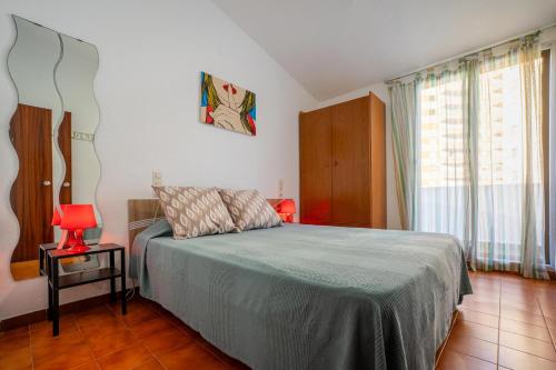 Ένα ή περισσότερα κρεβάτια σε δωμάτιο στο Gregal Vidaber Adosado