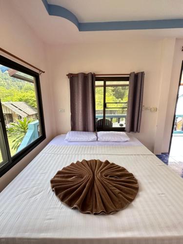 Ένα ή περισσότερα κρεβάτια σε δωμάτιο στο Euphoria Bungalow