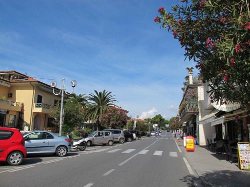 a city street with cars parked on the side of the road at Apartment Celeste by Interhome in Cinquale