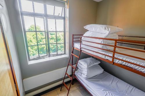 Cama o camas de una habitación en Rest Up London