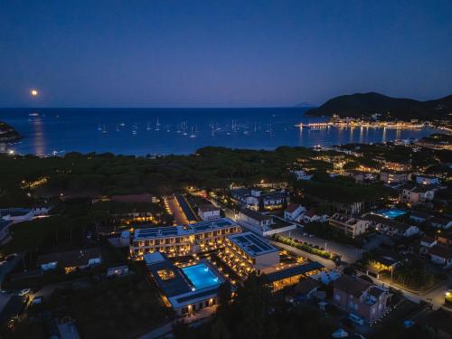 an aerial view of a city at night at Campoblù in Marina di Campo