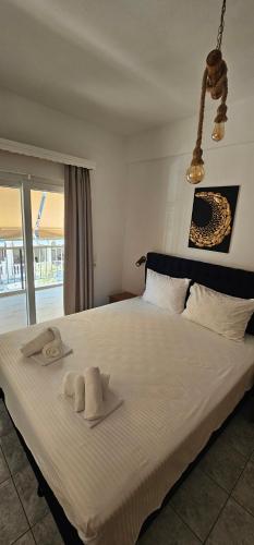 Postel nebo postele na pokoji v ubytování Julsun apartment