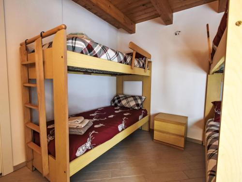 Katil atau katil-katil dalam bilik di Apartment Ai Tini by Interhome