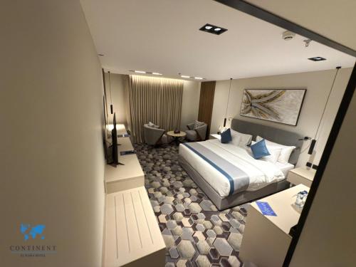 Katil atau katil-katil dalam bilik di Continent Al Waha Hotel Riyad