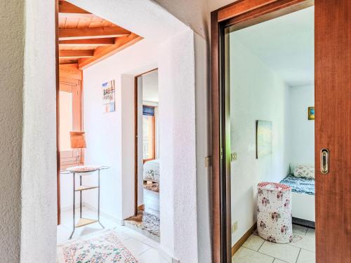 Katil atau katil-katil dalam bilik di Holiday Home Milù by Interhome