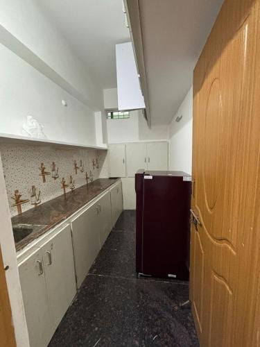 Kuchyň nebo kuchyňský kout v ubytování Coco spaces Hyderabad