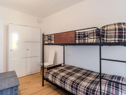 Postel nebo postele na pokoji v ubytování Apartment La Scaletta by Interhome