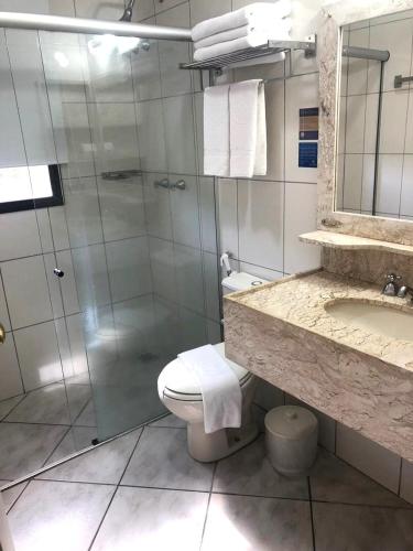 Ein Badezimmer in der Unterkunft Hotel São Luiz