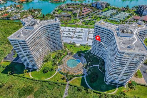 an aerial view of a large building with a red dot at The Breezy Perch in Marco Island