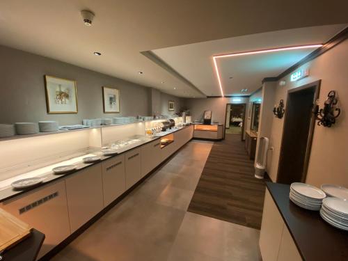 Η κουζίνα ή μικρή κουζίνα στο Stadthotel Patrizier