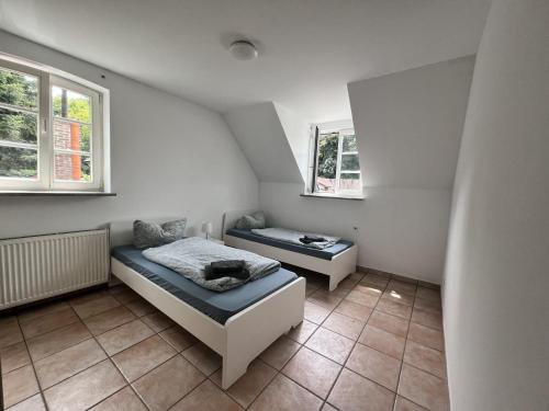 Foto Große Apartments mit Einzelbetten Ideal für Teams & Gruppen Köln