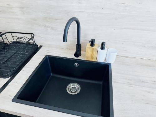 Η κουζίνα ή μικρή κουζίνα στο Maison Charmante - Pro & Famille - Tout Confort - 5 Chambres