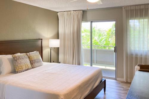 Una cama o camas en una habitación de Plantation Hale D10