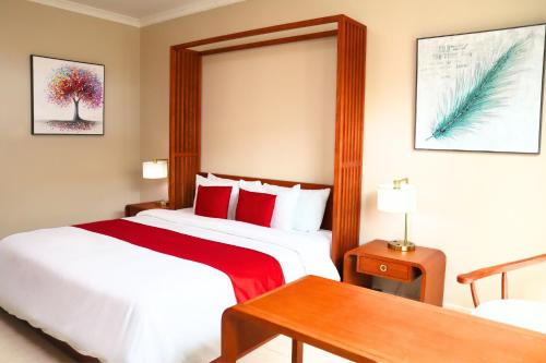 Postel nebo postele na pokoji v ubytování Golden Bay Belize Hotel