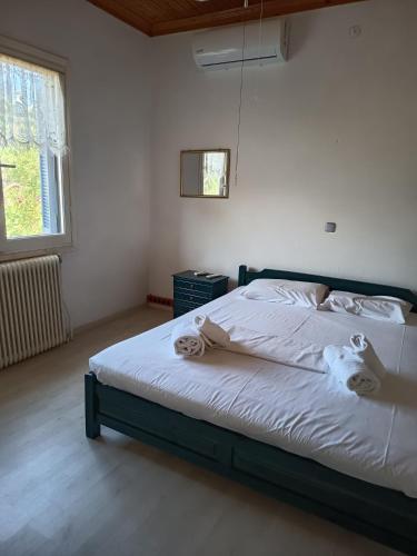 Postel nebo postele na pokoji v ubytování Leon mare villa
