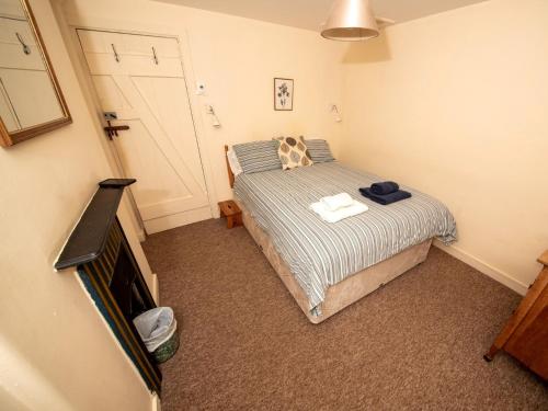 Ένα ή περισσότερα κρεβάτια σε δωμάτιο στο 2 Bed in Studland DC069