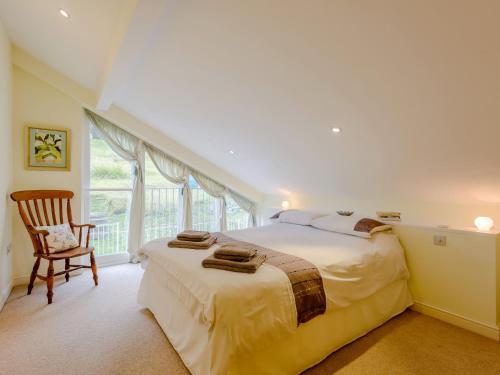 Ένα ή περισσότερα κρεβάτια σε δωμάτιο στο 4 bed in Lulworth CHRIC