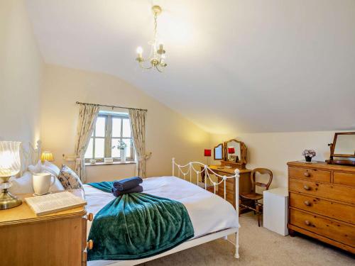 Ένα ή περισσότερα κρεβάτια σε δωμάτιο στο 3 Bed in Tywyn DY021