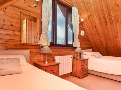 Ένα ή περισσότερα κρεβάτια σε δωμάτιο στο 2 bed in Launceston TWIME