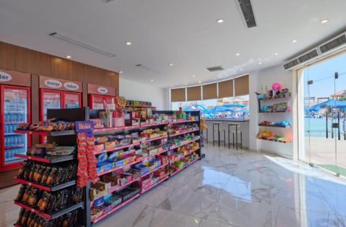 a store aisle with a lot of products on display at Ramage Hotel & Resort in Cairo