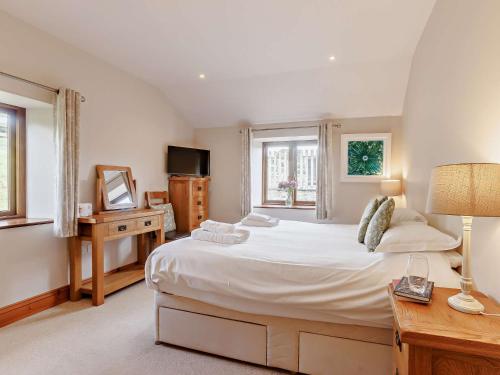 Ένα ή περισσότερα κρεβάτια σε δωμάτιο στο 4 Bed in Launceston BRHIG