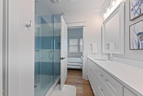 a bathroom with a shower and a sink at Stunning New Home with Private Pool in Seabrook Island