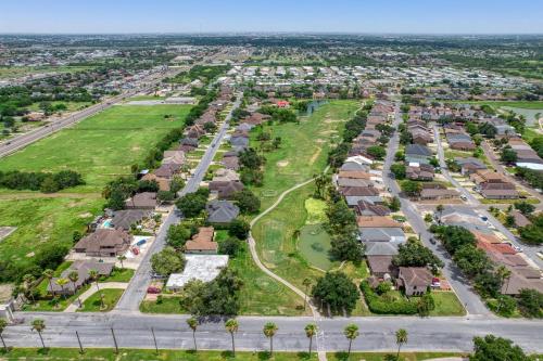 an aerial view of a neighborhood of houses at Bright Pharr Getaway Spacious Family Home w Garage and WiFi in Pharr