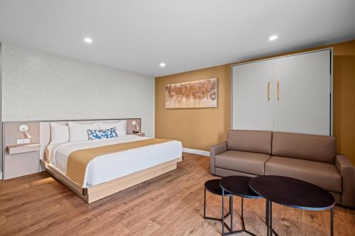 Ένα ή περισσότερα κρεβάτια σε δωμάτιο στο Days Inn by Wyndham Riviere-Du-Loup