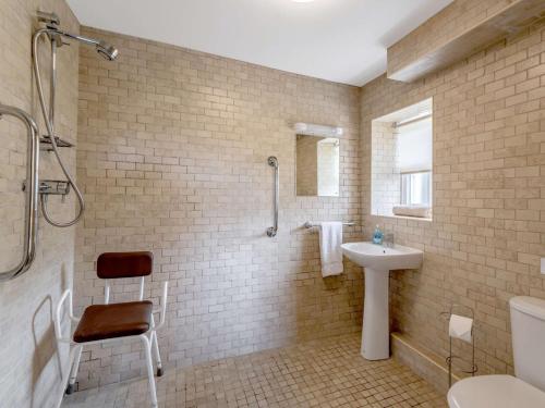 a bathroom with a shower and a sink at 8 bed in Cockermouth 82453 in Bridekirk