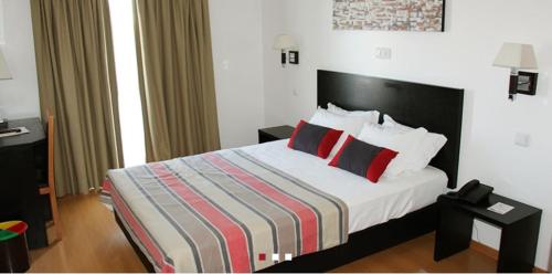 Ένα ή περισσότερα κρεβάτια σε δωμάτιο στο Hotel A Esteva