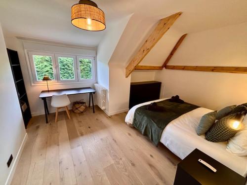 Llit o llits en una habitació de Villa Allure