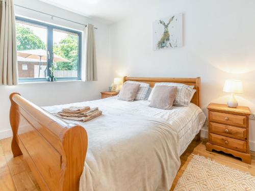 Ένα ή περισσότερα κρεβάτια σε δωμάτιο στο 2 Bed in Okehampton 75708