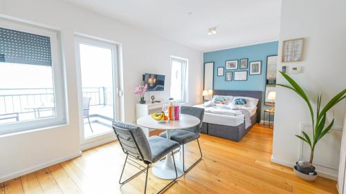 Ένα ή περισσότερα κρεβάτια σε δωμάτιο στο Christiano Apartments Hauptbahnhof | contactless check-in