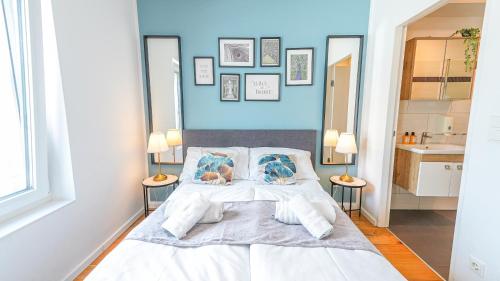 Ένα ή περισσότερα κρεβάτια σε δωμάτιο στο Christiano Apartments Hauptbahnhof | contactless check-in