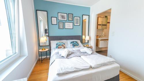 Ένα ή περισσότερα κρεβάτια σε δωμάτιο στο Christiano Apartments Hauptbahnhof | contactless check-in