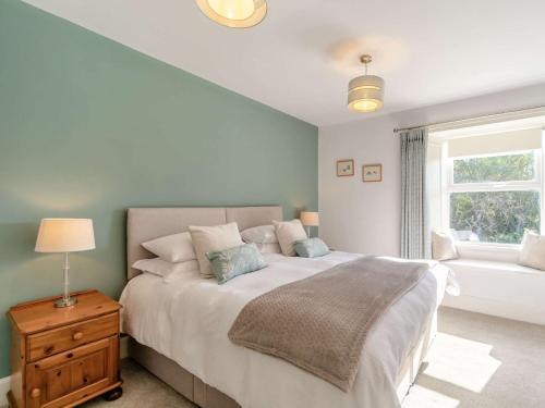 Ένα ή περισσότερα κρεβάτια σε δωμάτιο στο 4 Bed in Hexham 87458