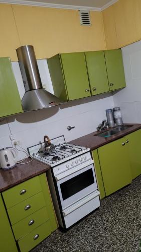 Kuchyň nebo kuchyňský kout v ubytování Casa Normy