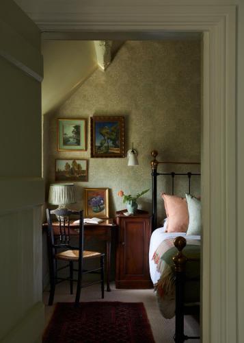 Ένα ή περισσότερα κρεβάτια σε δωμάτιο στο Cotswolds Escape