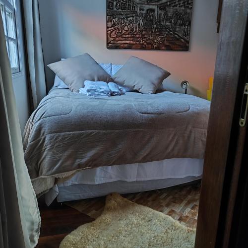 Ein Bett oder Betten in einem Zimmer der Unterkunft Lugar ao Sol