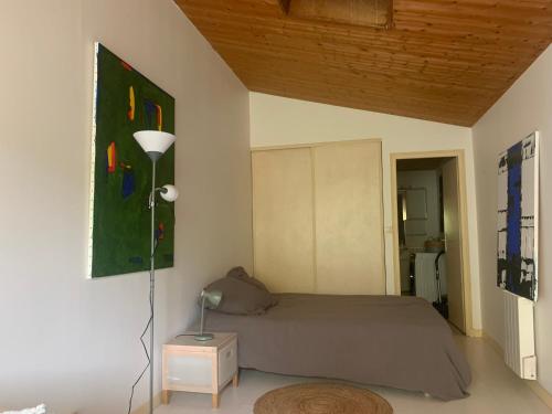 Postel nebo postele na pokoji v ubytování Chambres