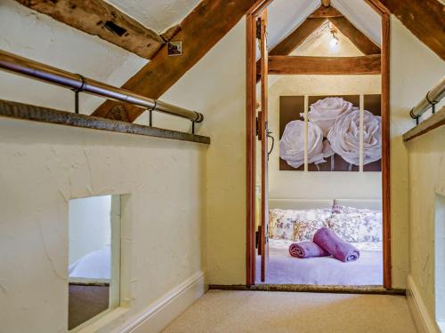 a room with a bunk bed and a mirror at 2 Bed in Coleford 78181 in Symonds Yat