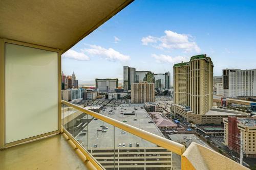 a view of a city skyline from a balcony at Sierra Studio at MGM Signature Tower 1 with Balcony Strip View 5 MIN WALK FROM F1 GRANDSTAND in Las Vegas
