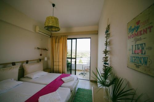 En eller flere senge i et værelse på Gorgona Studios