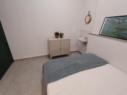 Postel nebo postele na pokoji v ubytování Alexa Host Vallecas