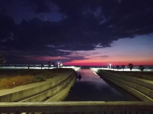 a view of a road with a sunset in the background at Vala Sea Breeze in Draçi