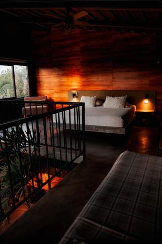 a bedroom with a bed in a room at Ecoparadise Hotel in Pereira
