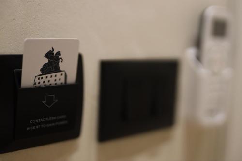 a box with a picture of a cat on it at Rooms Kruja City in Krujë