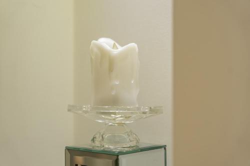 a glass vase sitting on top of a table at Chingford Manor in Chingford