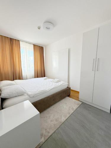 Ένα ή περισσότερα κρεβάτια σε δωμάτιο στο PANAMERA Best of Ilidza two-bedroom apartment