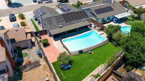 an aerial view of a house with a swimming pool at Backyard Oasis Private Villa Pool Hot Tub in El Cajon